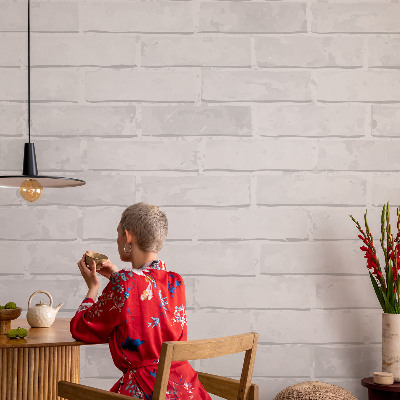 Vliesbehang fotobehang woonkamer met print van een bakstenen muur