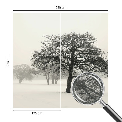 Vliesbehang fotobehang woonkamer met motief van winterbomen