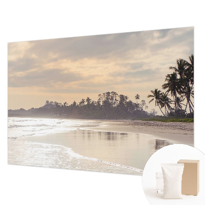 Naadloos fotobehang met een ochtend op het strand als print