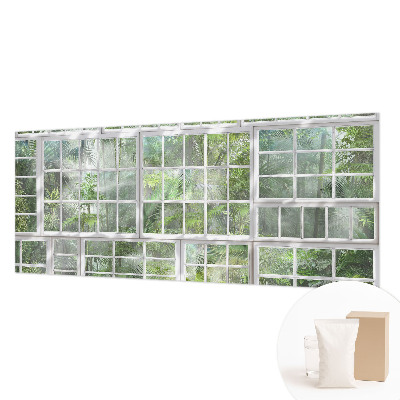 Vliesbehang fotobehang woonkamer met een groen bosmotief