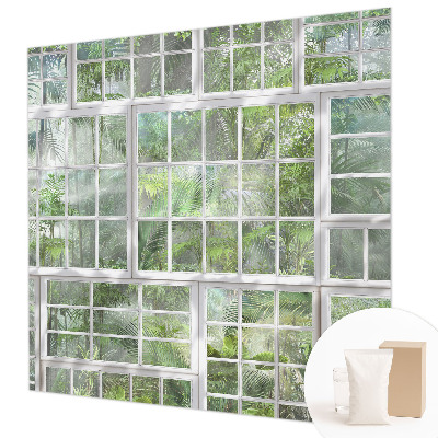 Vliesbehang fotobehang woonkamer met een groen bosmotief