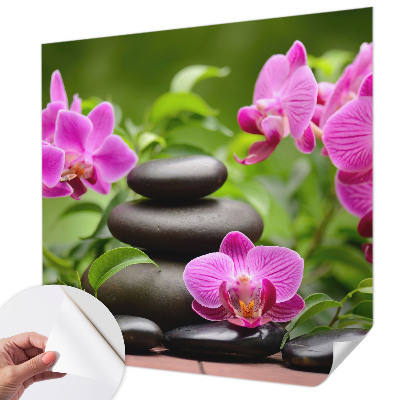 Fotobehang babykamer met orchideeën en steenmotief