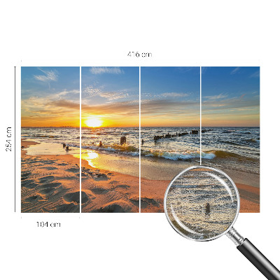 Foto behang voor de kinderkamer met een zonsondergang op het strand