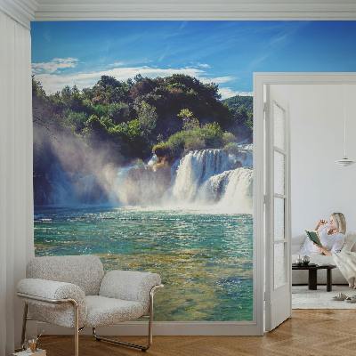 Zelfklevende behangsticker met een watervallandschap