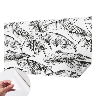 Fotobehang zelfklevend met een print van bananenbladeren
