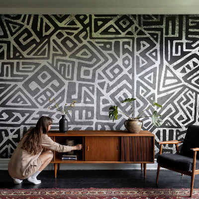 Fotobehang babykamer met een geometrisch doolhofpatroon
