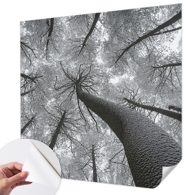 Zelfklevende behangsticker met een winterlandschap