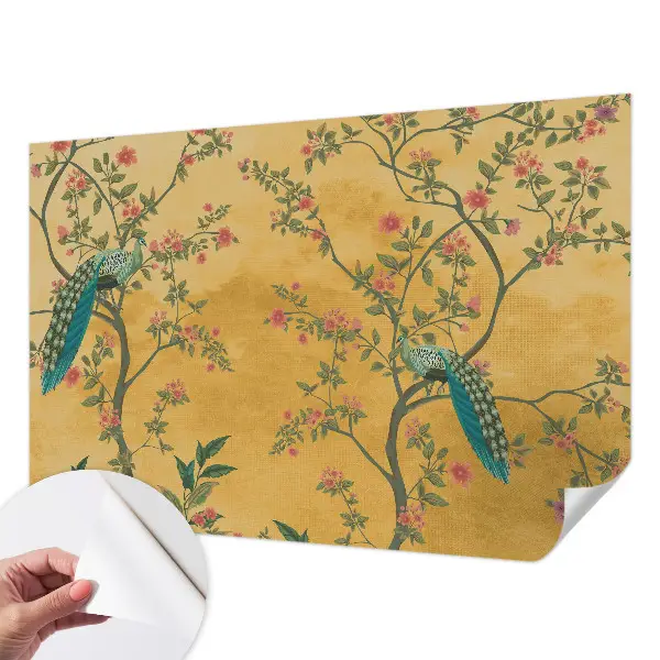 Fotobehang babykamer met een patroon van pauwen in bomen