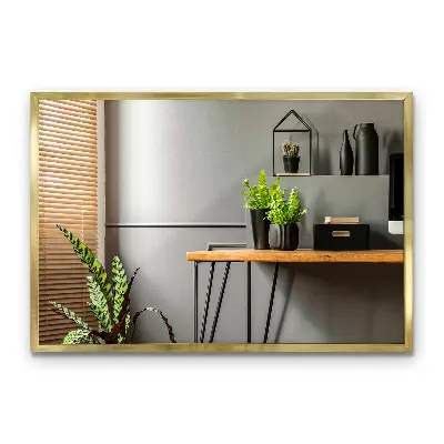 Elegante spiegel met gouden rand