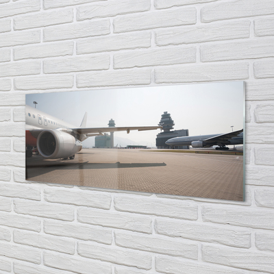 Plexiglas schilderij Vliegtuig gebouwen luchthaven lucht