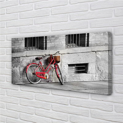 Schilderijen op canvas doek Rode fiets met een mand