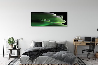 Schilderij canvas Hoofd van een man met een groen licht