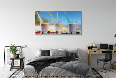 Canvas doek foto Cocktailglas kleurrijke rietjes