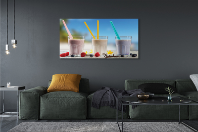 Canvas doek foto Cocktailglas kleurrijke rietjes
