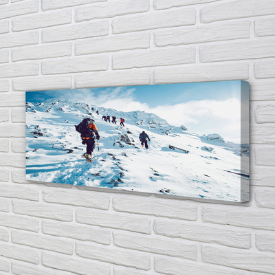 Canvas doek foto Klimmen in de winterbergen