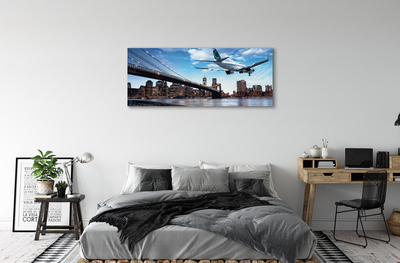 Schilderijen op canvas doek Vliegtuig stadswolken