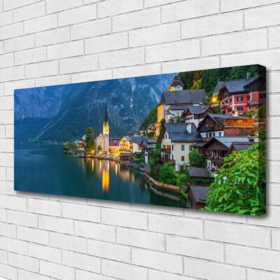 Canvas doek foto Mountain lake town 's nachts