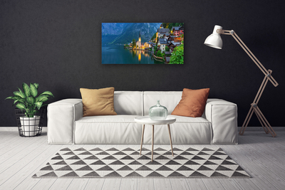 Canvas doek foto Mountain lake town 's nachts