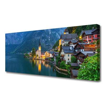 Canvas doek foto Mountain lake town 's nachts