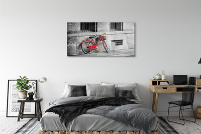 Schilderij op glas Rode fiets met een mand