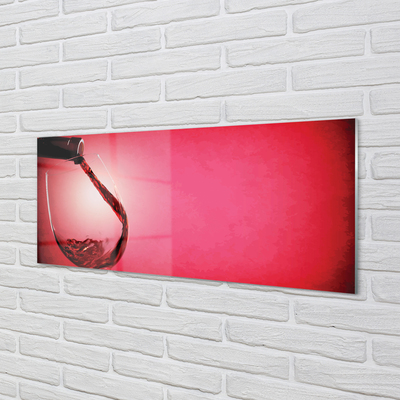 Glas schilderij Rode achtergrond met een glas over