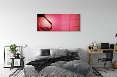 Glas schilderij Rode achtergrond met een glas over