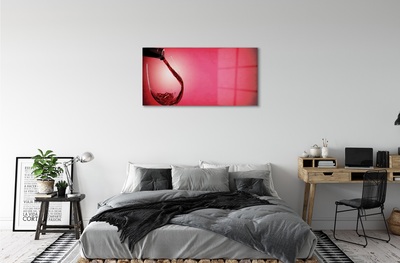 Glas schilderij Rode achtergrond met een glas over