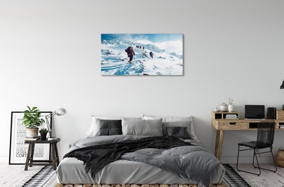 Glas schilderij Klimmen in de winterbergen