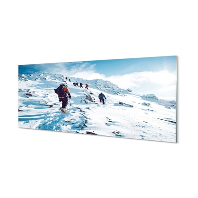 Glas schilderij Klimmen in de winterbergen