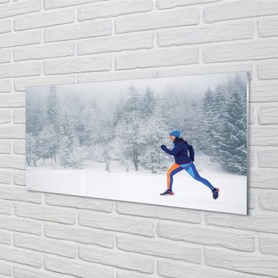 Foto schilderij op glas Boswinter sneeuw man
