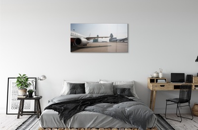 Schilderij op glas Vliegtuig gebouwen luchthaven lucht