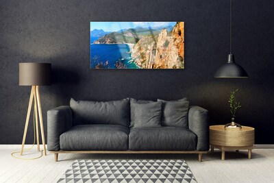Foto schilderij op glas Sea cliff coast mountains