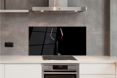 Spatplaat keuken glas Zwarte achtergrond met wijnglas