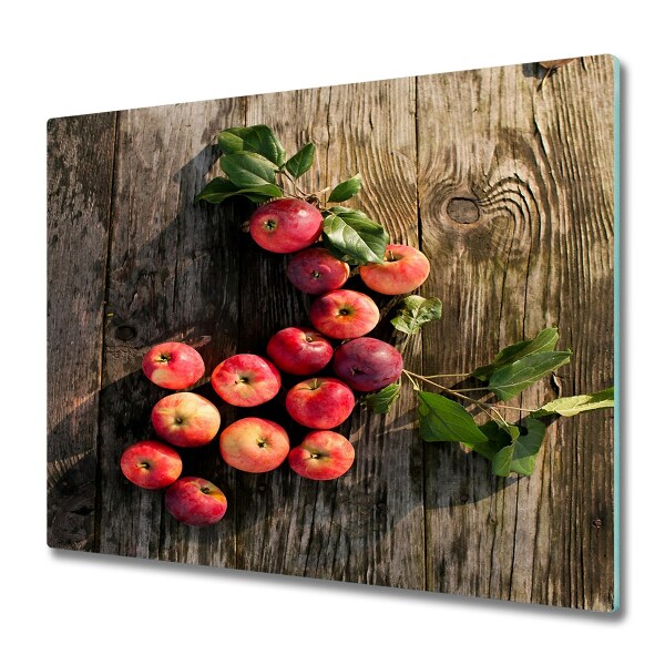 Snijplank van glas Apple op de tafel
