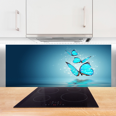 Keuken achterwand glas met print Blauwe vlinders water kunst
