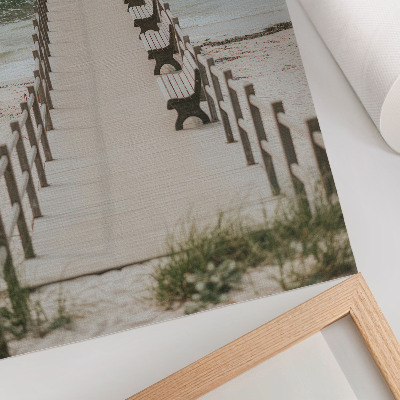 Decoratieve poster Een minimalistische pier die rechtstreeks de zee in loopt.
