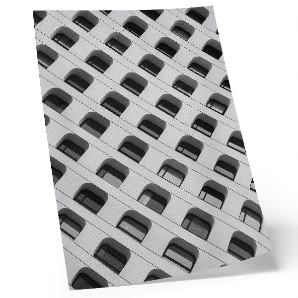 Wandposter Een minimalistische gevel vol herhalende vormen.