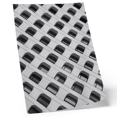 Wandposter Een minimalistische gevel vol herhalende vormen.