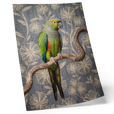 Decoratieve poster Papegaai op een tak met crèmekleurige bloemen en een blauwe achtergrond.