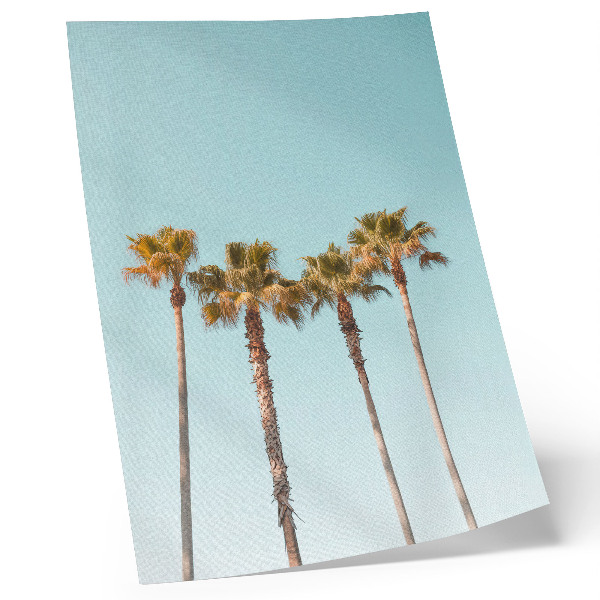Wandposter Palmbomen op een blauwe achtergrond, vakantievreugde en natuur.