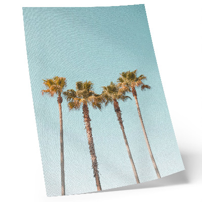 Wandposter Palmbomen op een blauwe achtergrond, vakantievreugde en natuur.