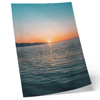 Wandposter Zonsondergang boven het water, een uiterst harmonieus landschap.