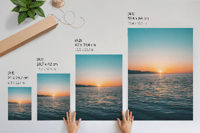 Wandposter Zonsondergang boven het water, een uiterst harmonieus landschap.