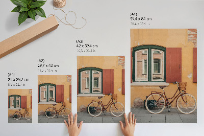 Poster Een fiets tegen de achtergrond van een kleurrijke retrogevel.