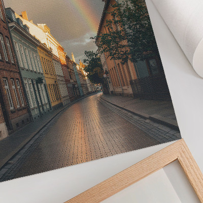 Poster Kleurrijke huurkazernes, regenboog, bewolkte lucht