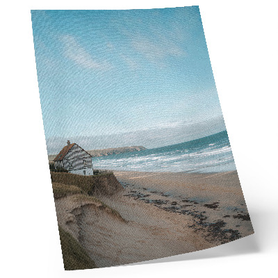 Poster Strand, golven, huis op een klif, pastelkleuren