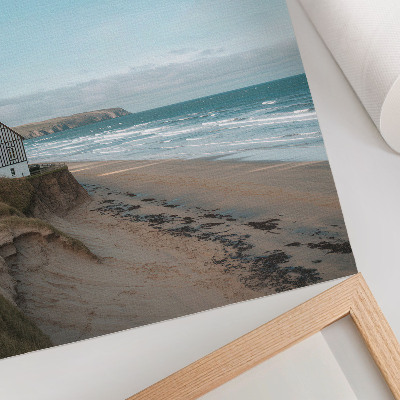 Poster Strand, golven, huis op een klif, pastelkleuren