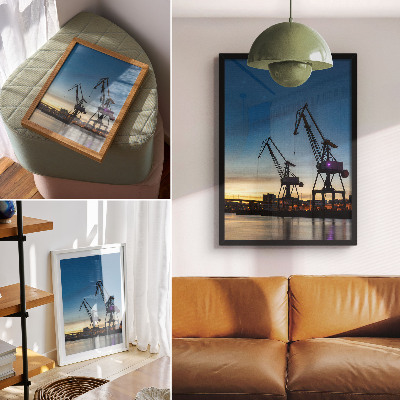 Decoratieve poster Kraanvogels tegen de achtergrond van een dynamische zonsondergang.