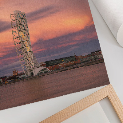 Wandposter Moderne toren, pastelkleurige lucht, zonsondergang