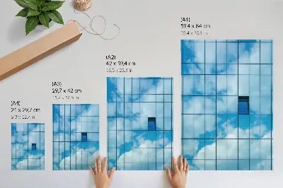 Wandposter met een reflectie van de lucht en wolken in een glazen gevel